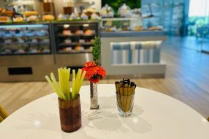 Edible Bamboo straws in a brown cup at la Parisienne