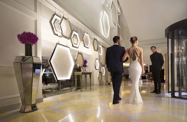 lobby-with-glamourous-couple-and-concierge