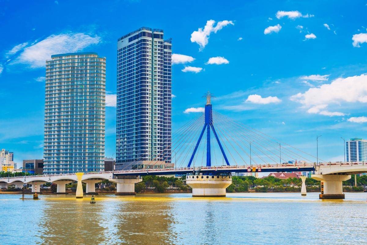 View of Han River Bridge with tall buildings and bright blue sky