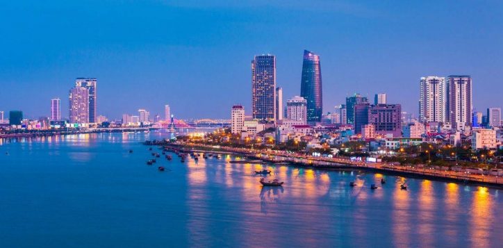 city-lights-reflecting-on-the-han-river-with-tall-buildings-along-the-waterfront