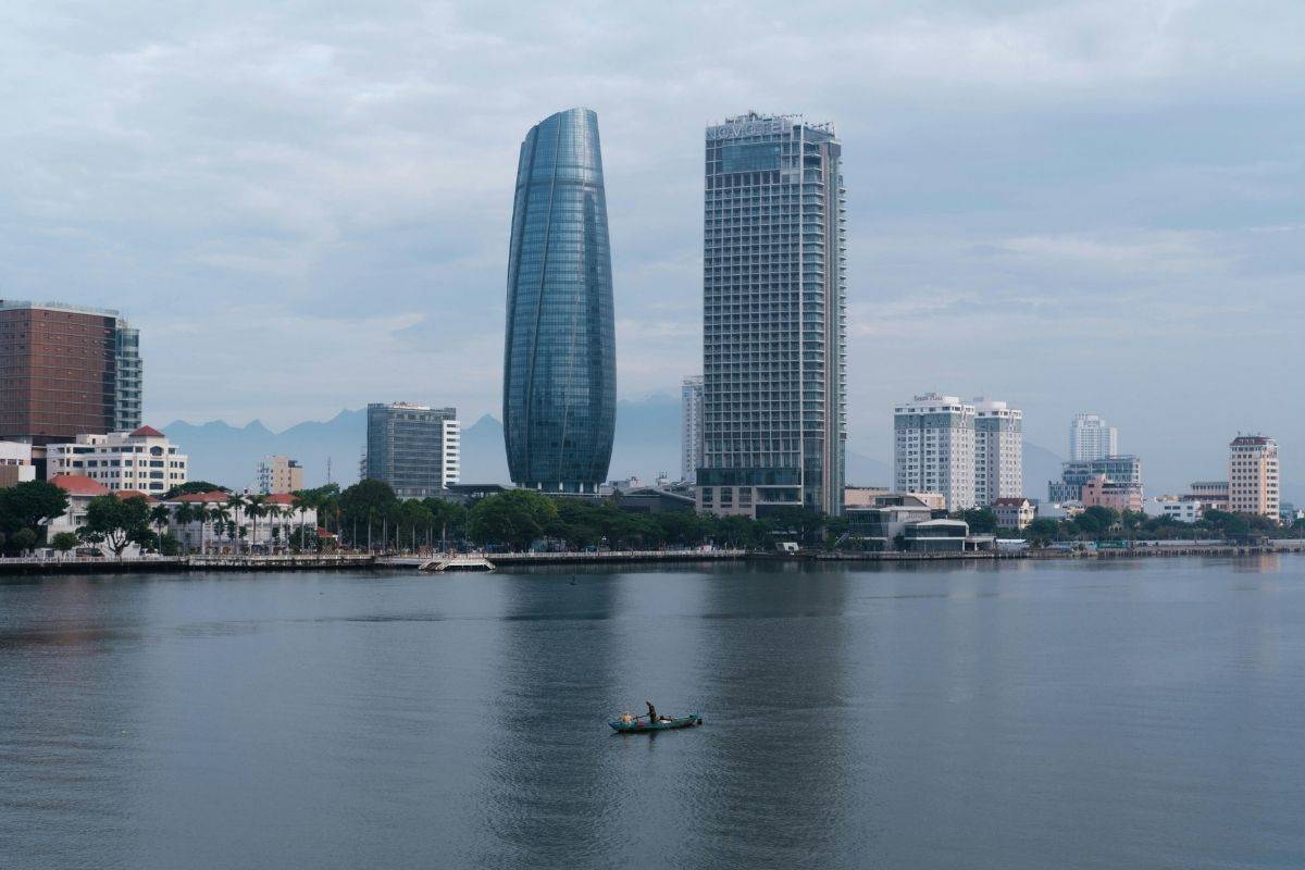 City skyline by the Han River with tall towers and calm water