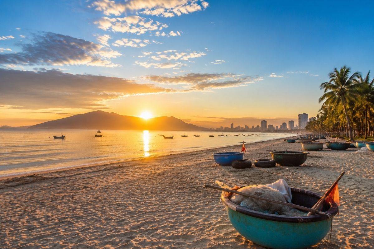 Basket boats on the sand at sunrise on Nguyen Tat Thanh Beach
