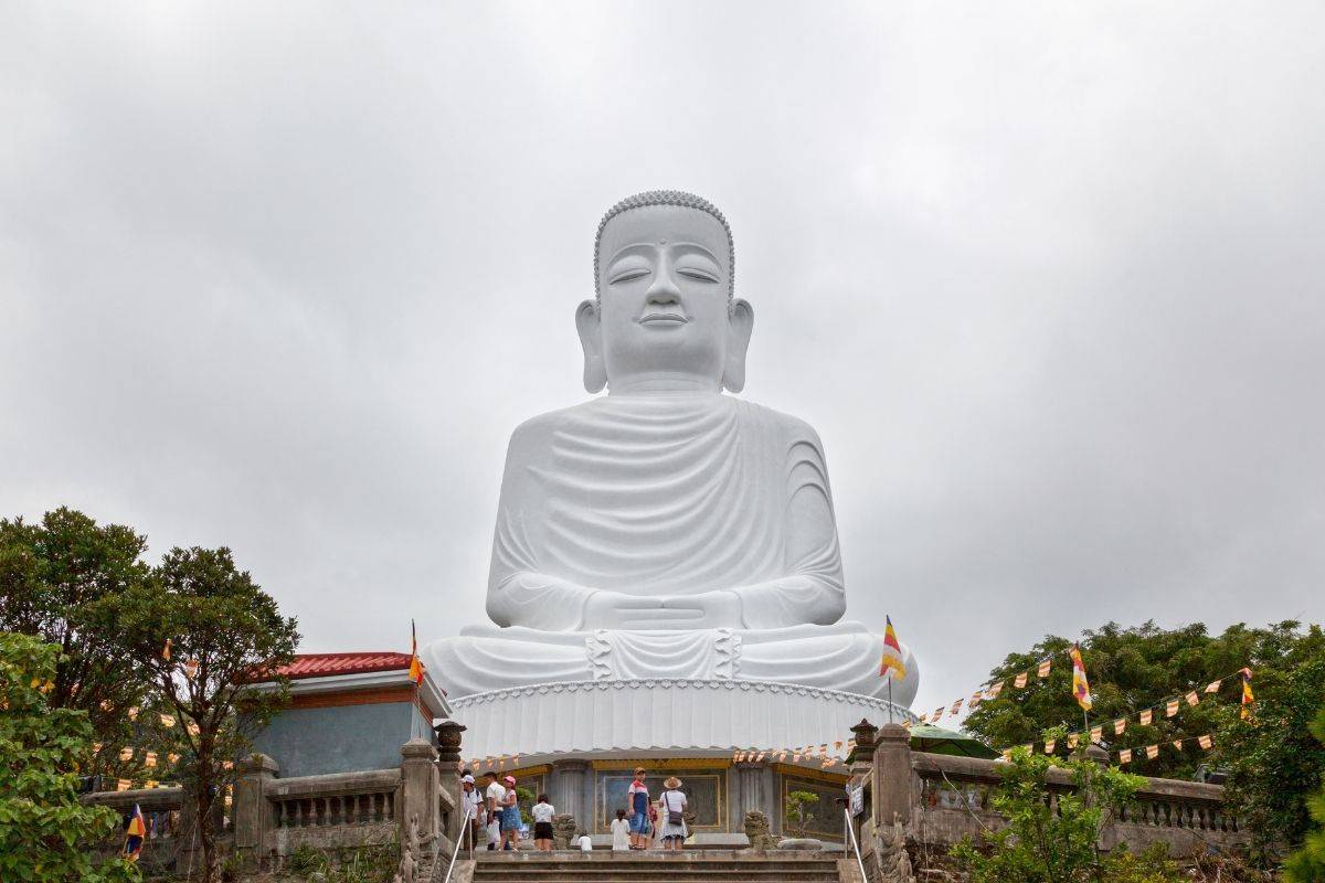 The 27-meter-tall Shakyamuni Buddha statue on a white lotus pedestal at Linh Ung Ba Na Pagoda