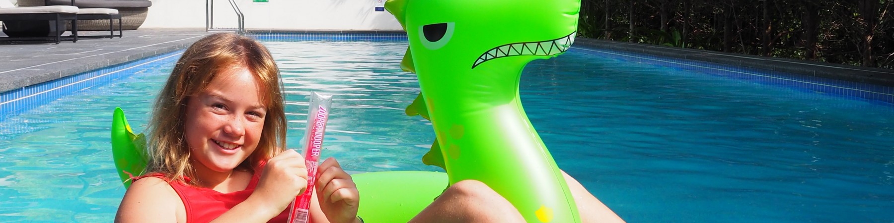 Kids in the pool with Dinosaur Inflatable Toy
