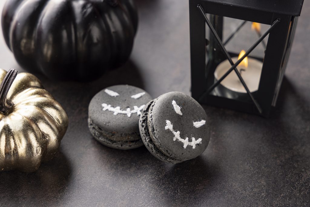 Skeleton black sesame macaron