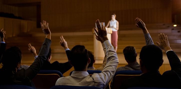 female-business-executive-giving-speech-1