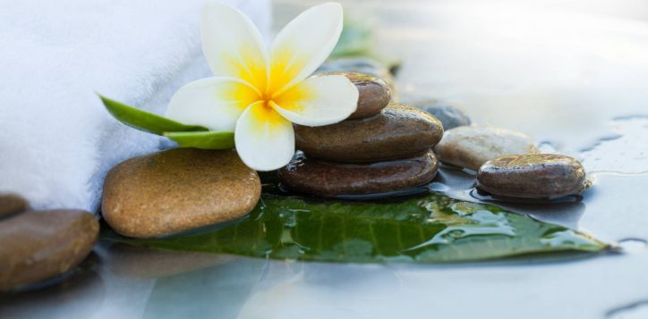 spa-concept-with-stones-flower-white-towel-2