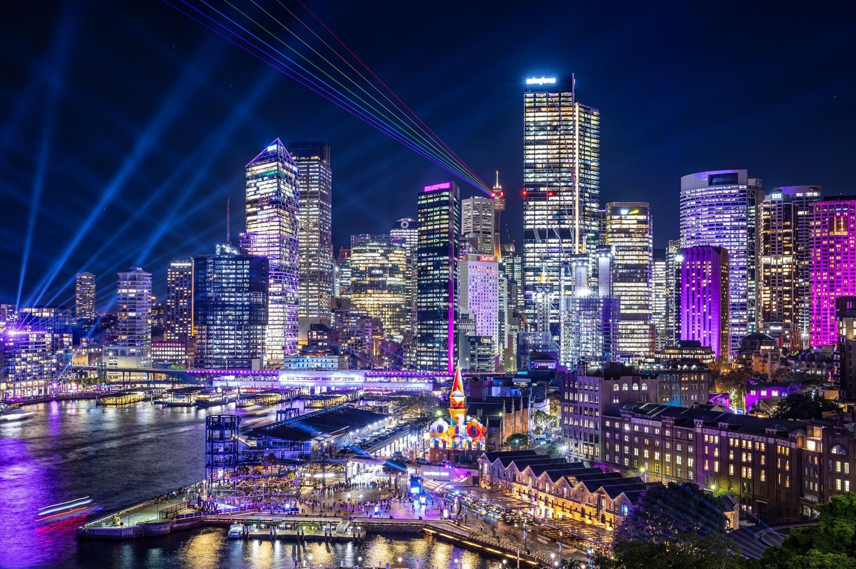 View of Sydney cityscape lit up during Vivid Sydney
