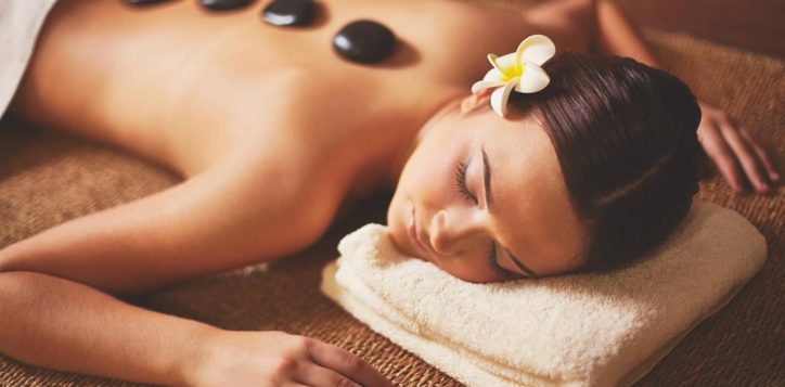 woman-enjoying-stone-massage