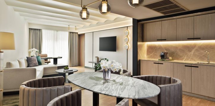 movenpick-bdms-wellness_family-suite-1bed-living-room-1-1