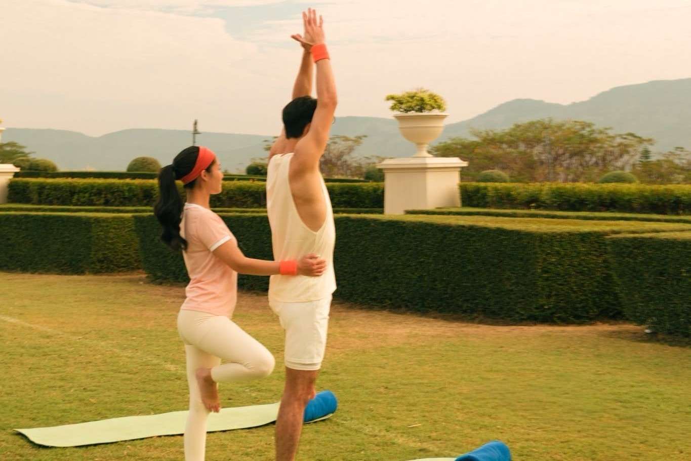 Full body stretching session on the resort lawn in Khao Yai