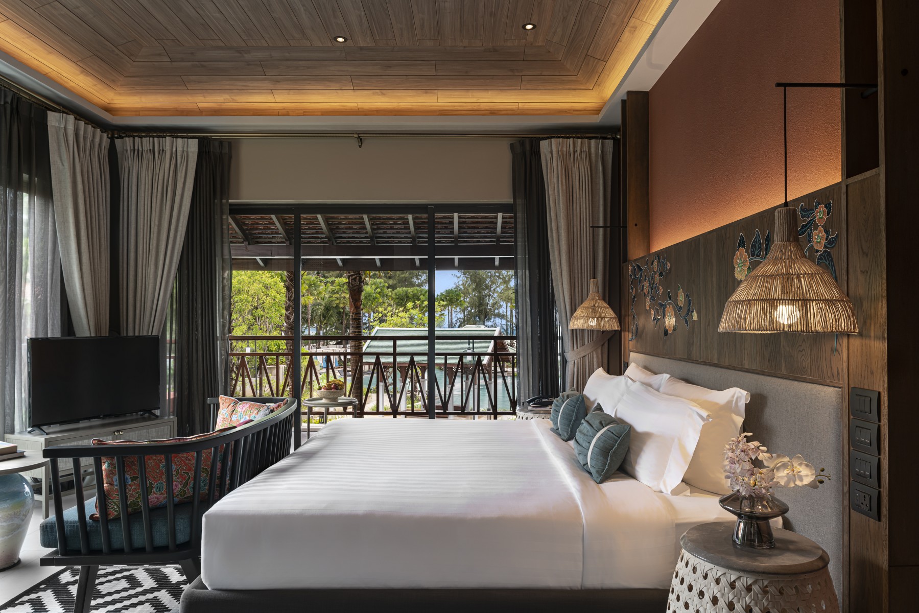 Deluxe Room at Grand Mercure Khao Lak Bangsak with private balcony and contemporary Thai design