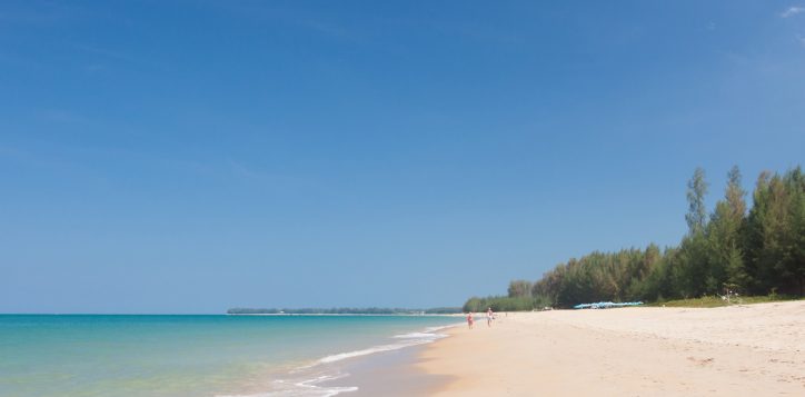 scenic-view-beach-against-blue-sky