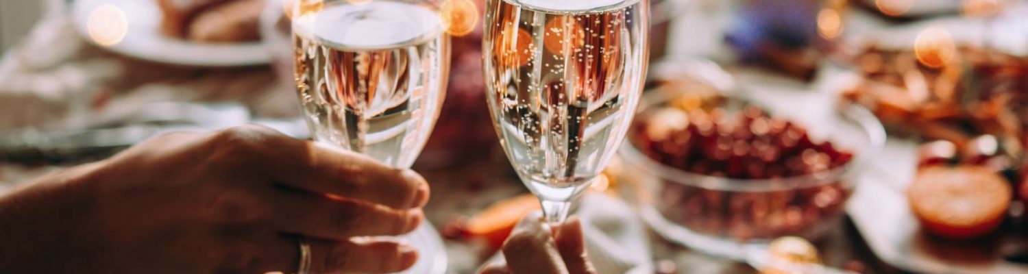 Two hands holding glasses with sparkling | Valentine Special Melbourne