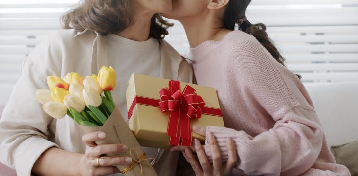 attractive-beautiful-asian-middle-age-mum-sit-with-grown-up-daughter-give-gift-box-and-flower-in-family-moment-celebrate-mother-day-overjoy-bonding-cheerful-kid-embrace-relationship-with-retired-mom