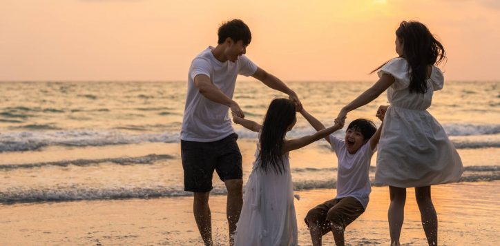 asian-young-happy-family-enjoy-vacation-beach-evening-dad-mom-kid-relax-playing-together-near-sea-when-silhouette-sunset-lifestyle-travel-holiday-vacation-summer-concept