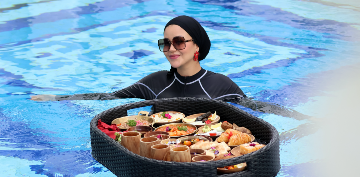 Halal-certified Middle East Floating Breakfast served on a luxury tray by the pool at Mövenpick Myth Hotel Patong Phuket