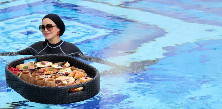 Halal-certified Middle East Floating Breakfast served on a luxury tray by the pool at Mövenpick Myth Hotel Patong Phuket