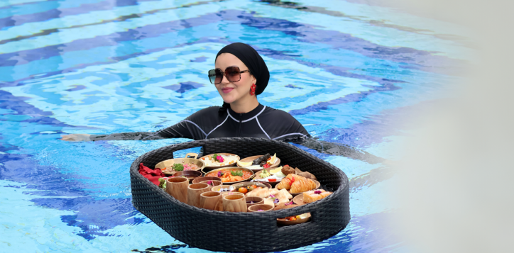 Halal-certified Middle East Floating Breakfast served on a luxury tray by the pool at Mövenpick Myth Hotel Patong Phuket