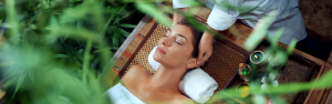 Woman enjoying head massage during Green Retreat spa treatment at A VIDA Spa, Mövenpick Myth Hotel Patong Phuket