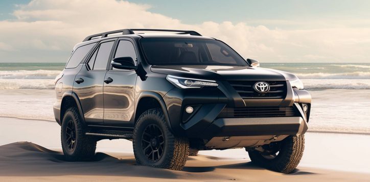 black-fortuner-car-parked-sandy-beach-waves-crashing-background