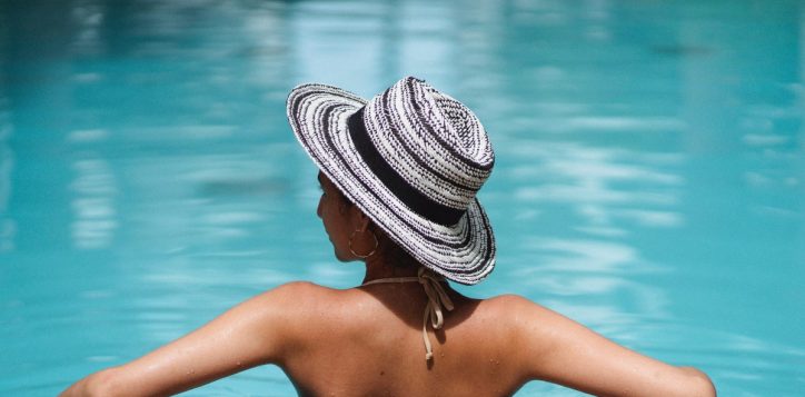 lady-with-hat-at-pool