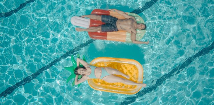 man-and-women-on-floats