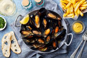 Mussels JLT offer at La Vue featuring a 500g fresh mussel pot with steak fries for AED 99 at Pullman Dubai Jumeirah Lakes Towers.