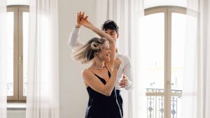 Couple dancing in the room at Sofitel Wellington