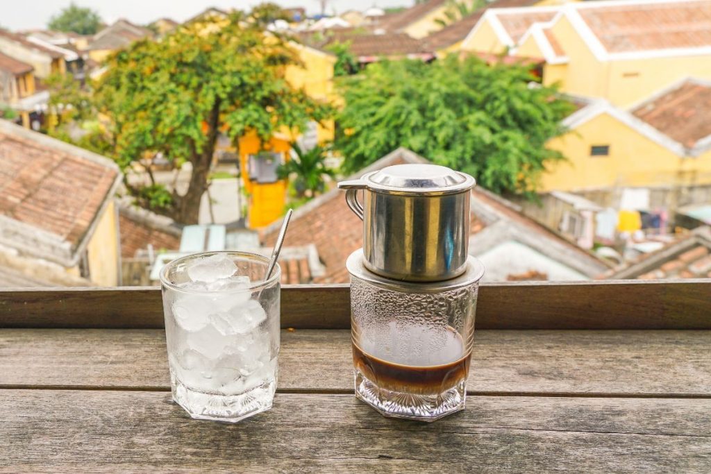 Hoi An Roastery – a traditional wooden café with warm yellow lighting and nostalgic charm in the heart of Hoi An