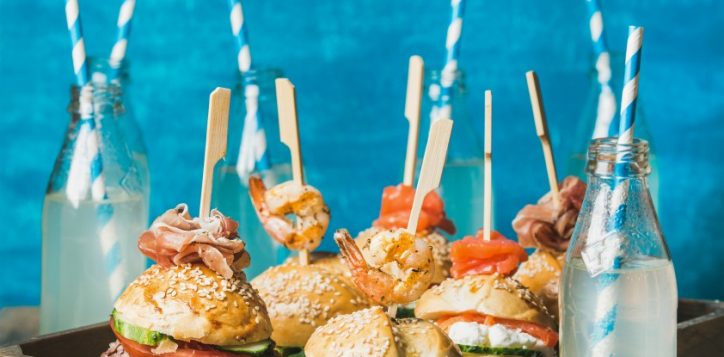 different-homemade-burgers-with-sticks-wooden-tray-lemonade