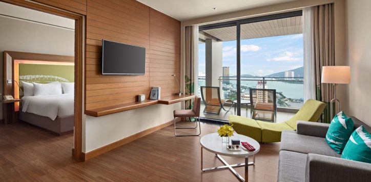 one-bedroom-apartment-balcony-living-room-novotel-danang-premier-han-river