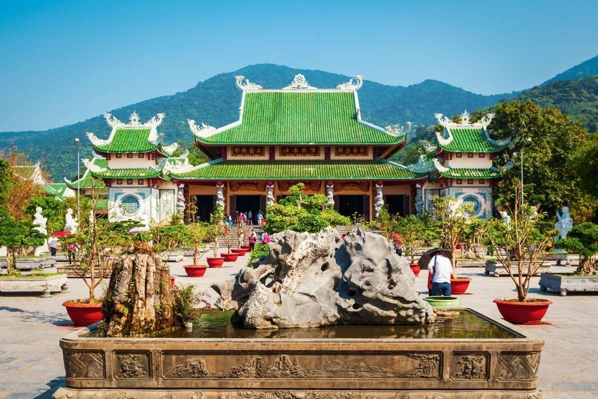 Linh Ung Pagoda in the Marble Mountains Da Nang complex overlooking the sea and limestone terrain
