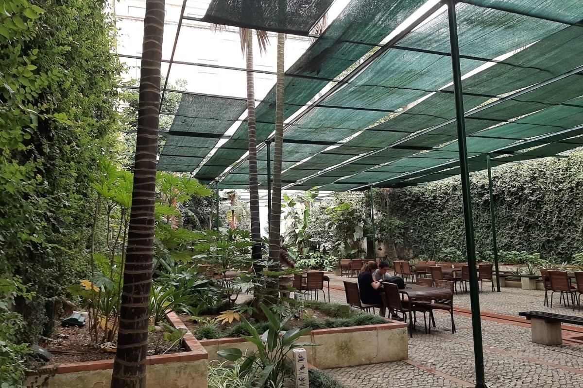 Lush green garden-style seating at The Garden Coffee in Da Nang